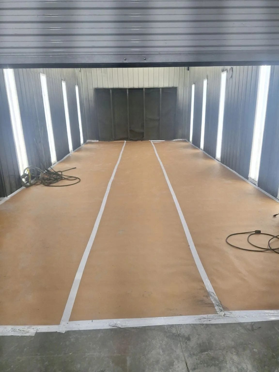 Clean illuminated industrial finish booth