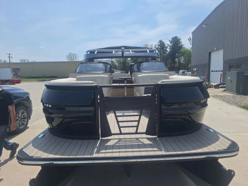 Finished dark pontoon boat viewed from the front